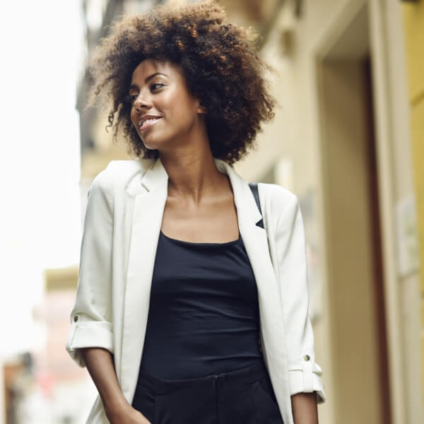 portrait-of-fashionable-young-woman-with-curly-hai-2024-09-14-22-21-22-utc-1.jpg